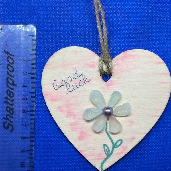 Wooden heart with 'good luck' sentiment, made using  sea glass.