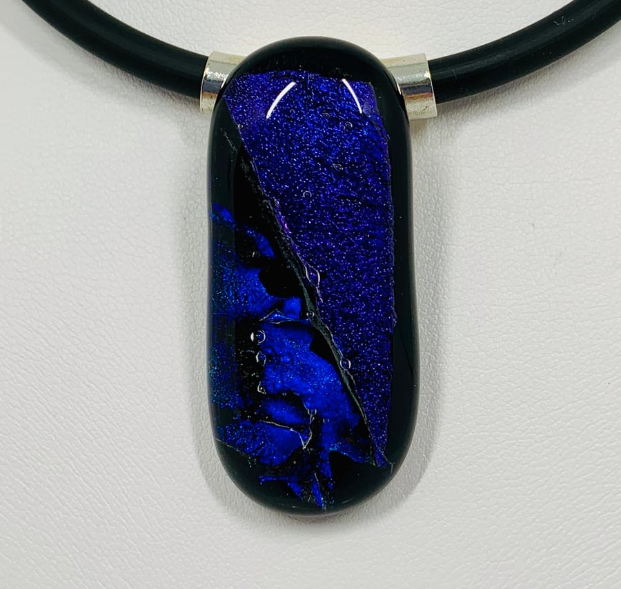 Purple & Blue Fused dichroic glass pendant with tube bail and black necklace.