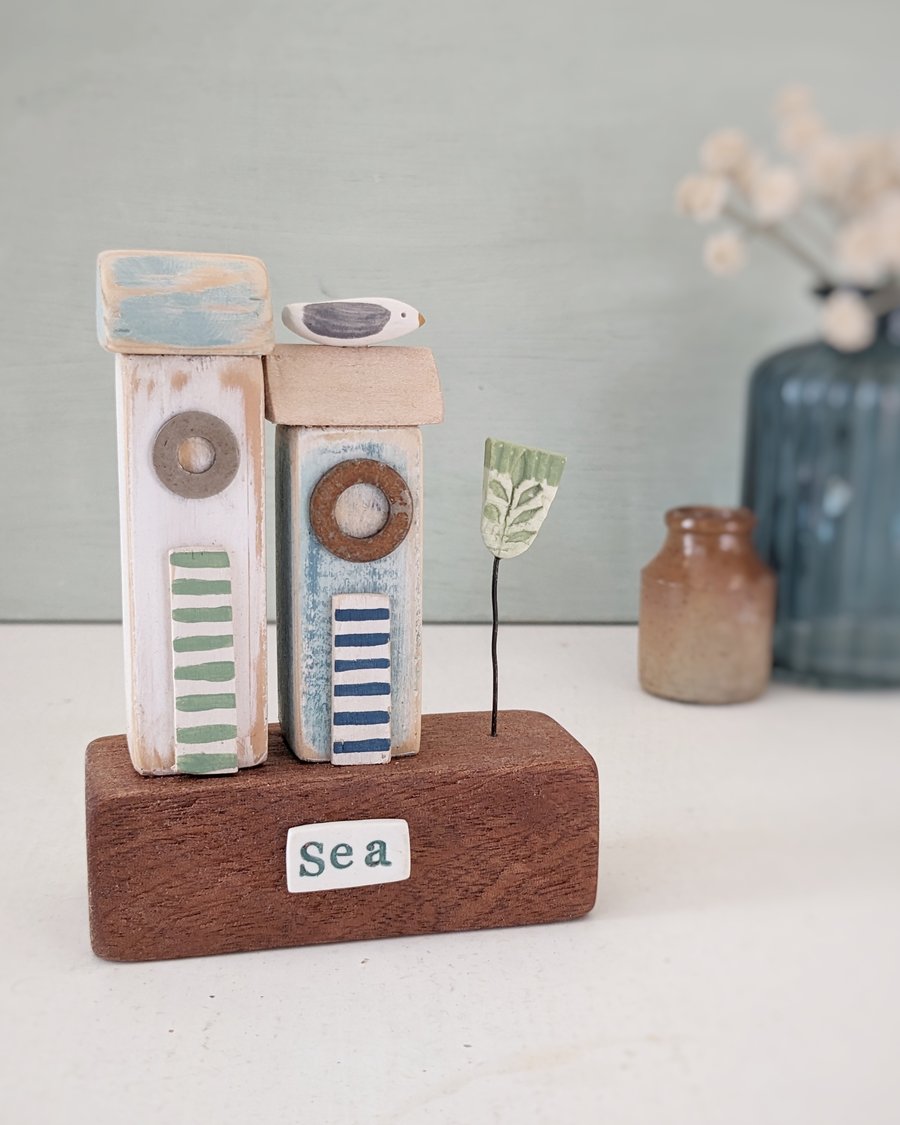 Little Wooden Sea Huts with Clay Flower  'Sea'