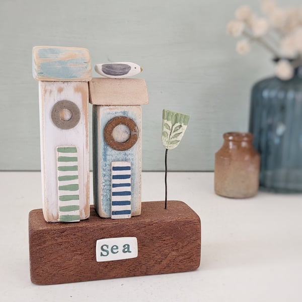 Little Wooden Sea Huts with Clay Flower  'Sea'