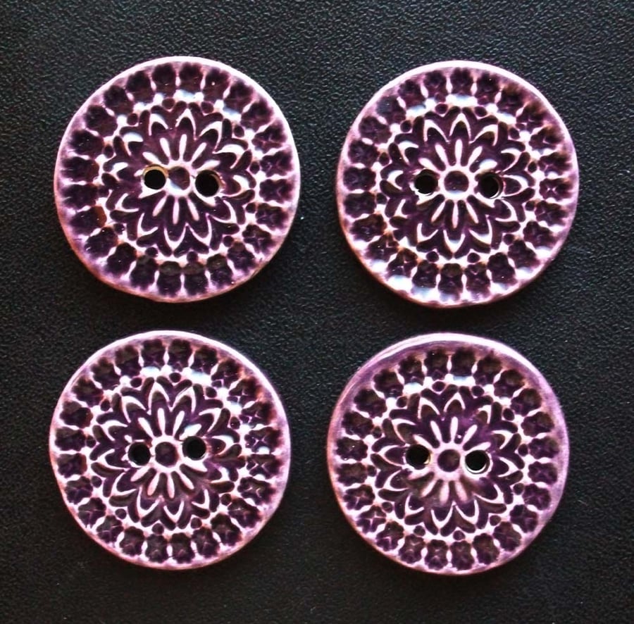 set of four large purple ceramic buttons 