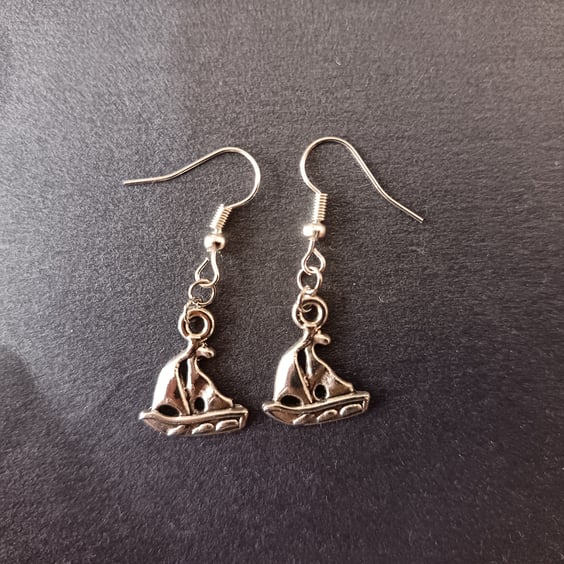 Silver sailboat dangle earrings 