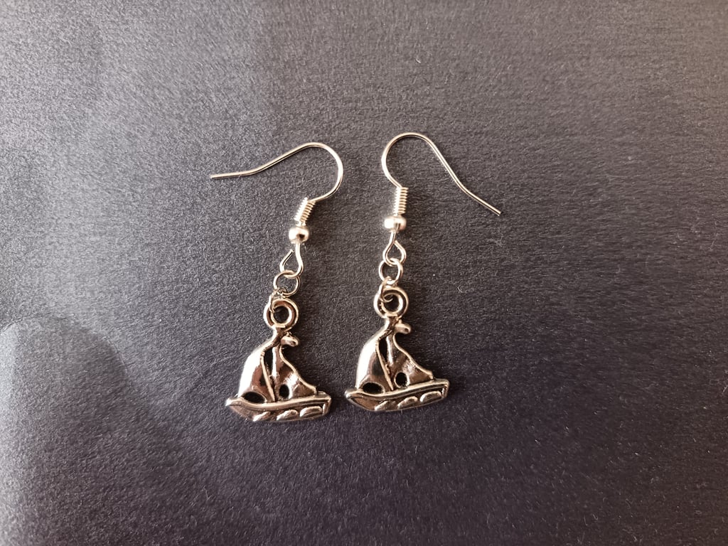 Silver sailboat dangle earrings 