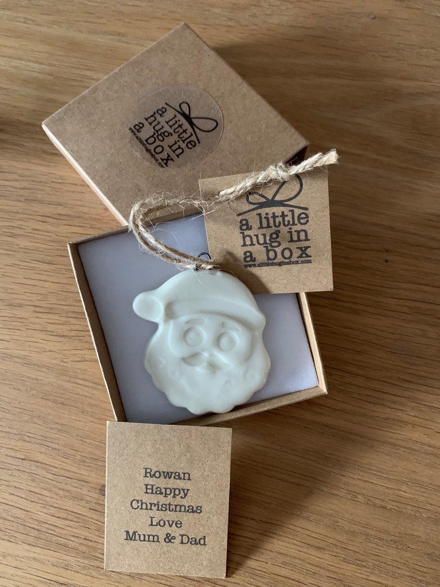 A little hug in a box glazed porcelain Santa Christmas decoration