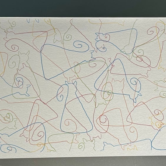 A Pack of Four Blank Cards Featuring Colourful Scattered Cats