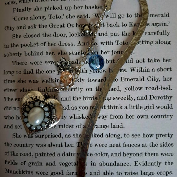 Unique metal bookmark with heart locket 