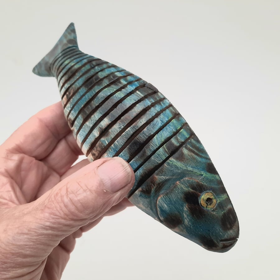 Articulating fish Folksy