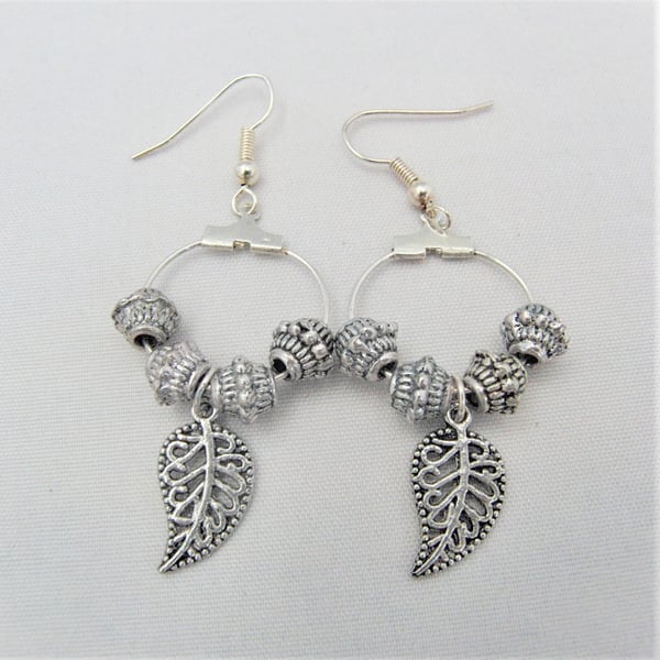 Silver Saturn Spacer and Leaf Charm Earrings for Pierced Ears, Jewellery Gift
