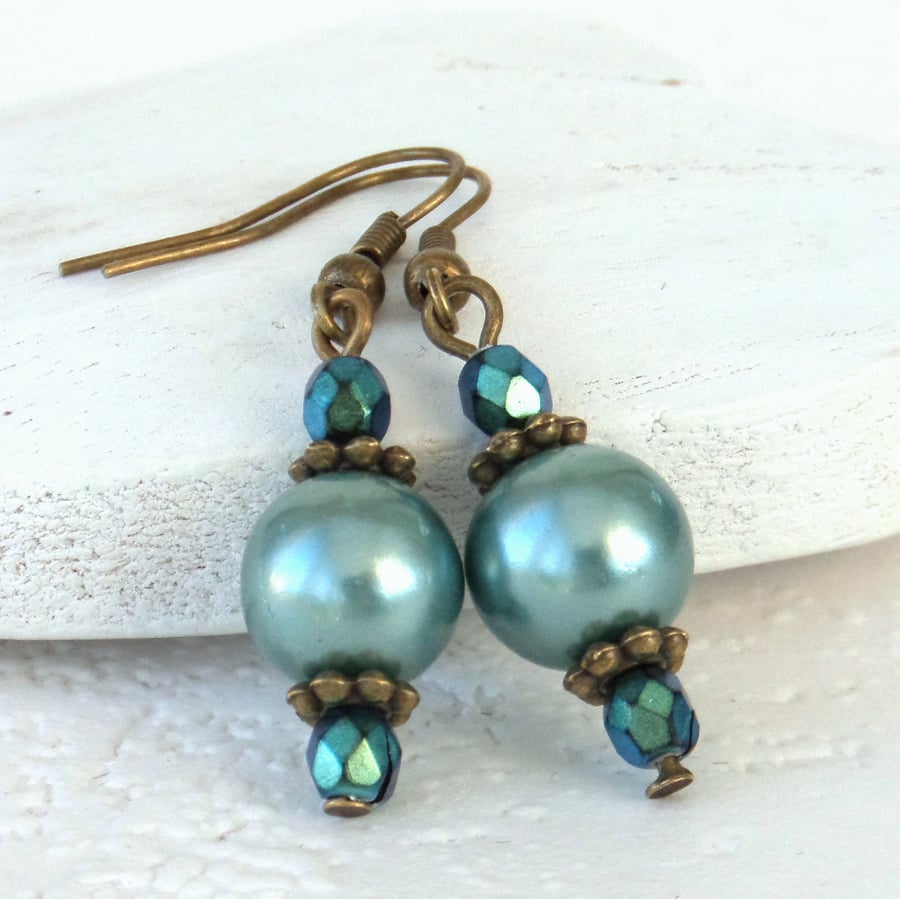 Teal green shell pearl and crystal bronze earrings