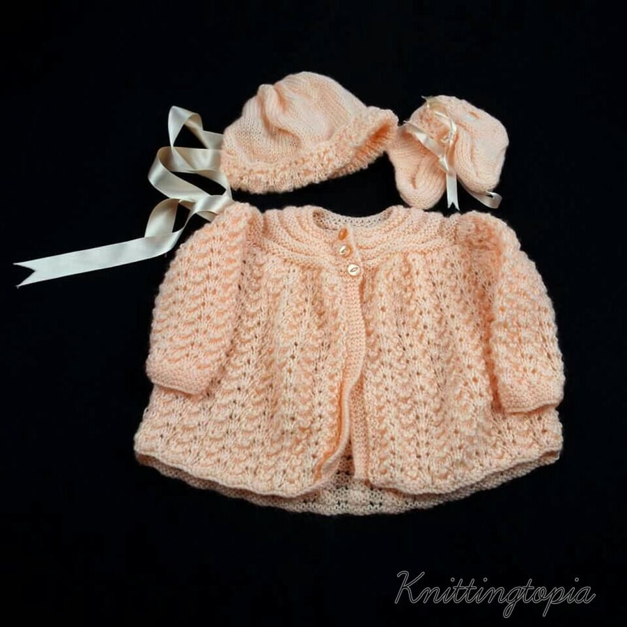 Hand knitted baby cardigan bonnet and booties to fit 12 months - peach - matinée