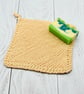 Hand knitted cotton wash cloth - peach - Image 1