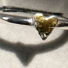 Stack ring with gold heart.