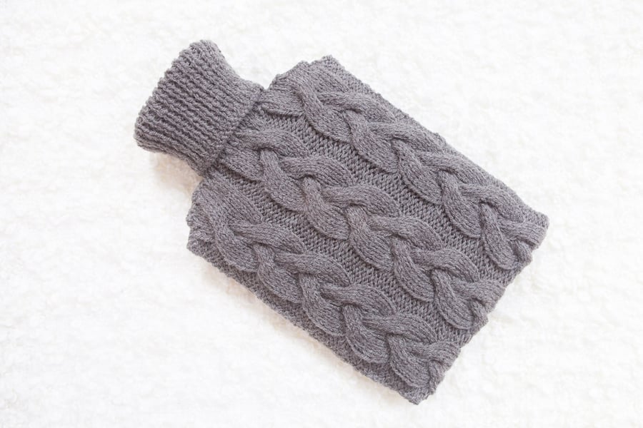 Hand knitted hot water bottle cover, cosy in grey. Rustic bedroom, home decor