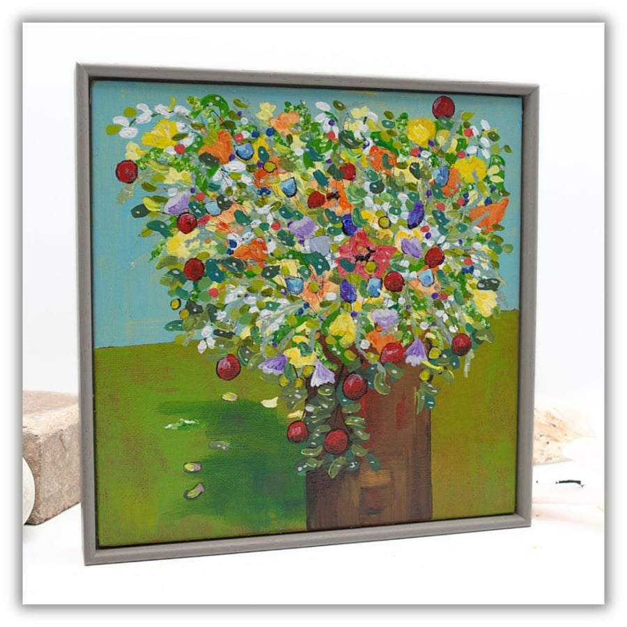 A colourful pot of spring flowers - a framed acrylic painting on canvas