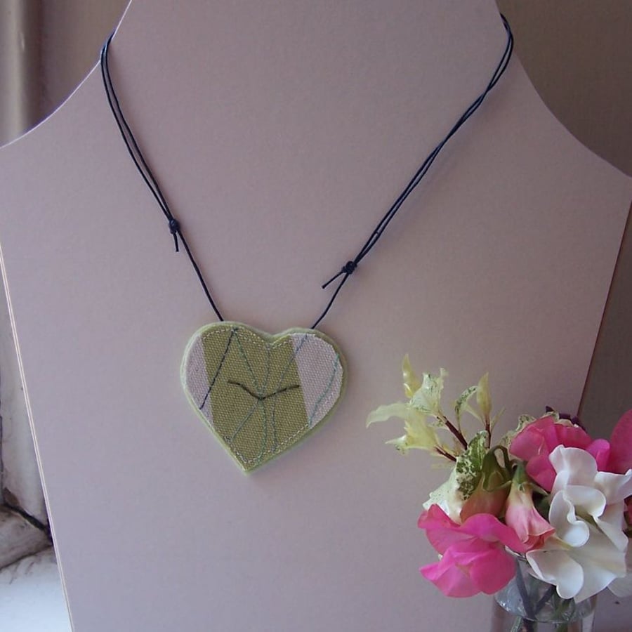 Ocean bird, heart shaped, hand and machine embroidered necklace