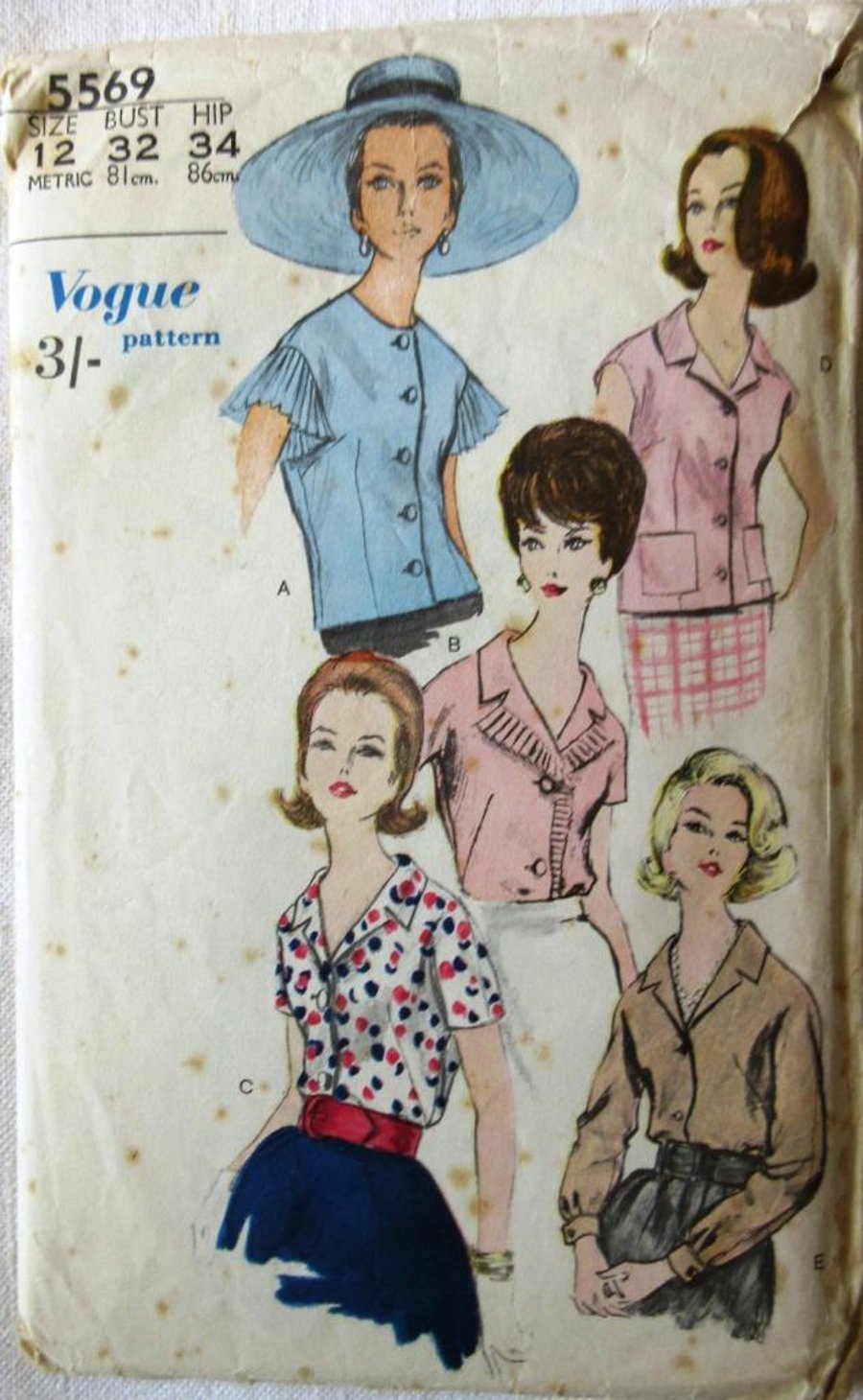 A vintage Vogue sewing pattern for women's blouses in 5 styles and size 12 