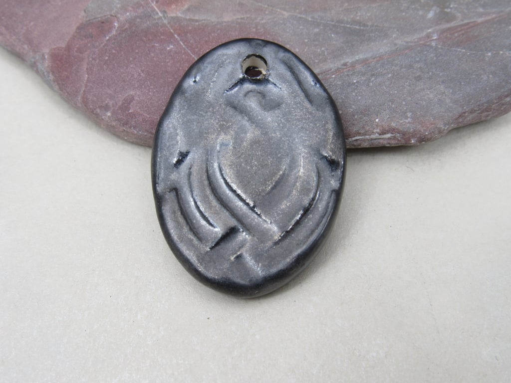 Large Metallic Knotwork Ceramic Pendant