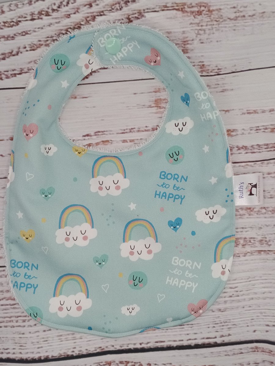 Newborn bamboo baby bib with clouds and rainbows