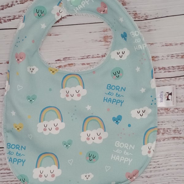 Newborn bamboo baby bib with clouds and rainbows