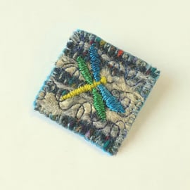 Needlefelted mixed textile brooch with hand embroidered dragonfly
