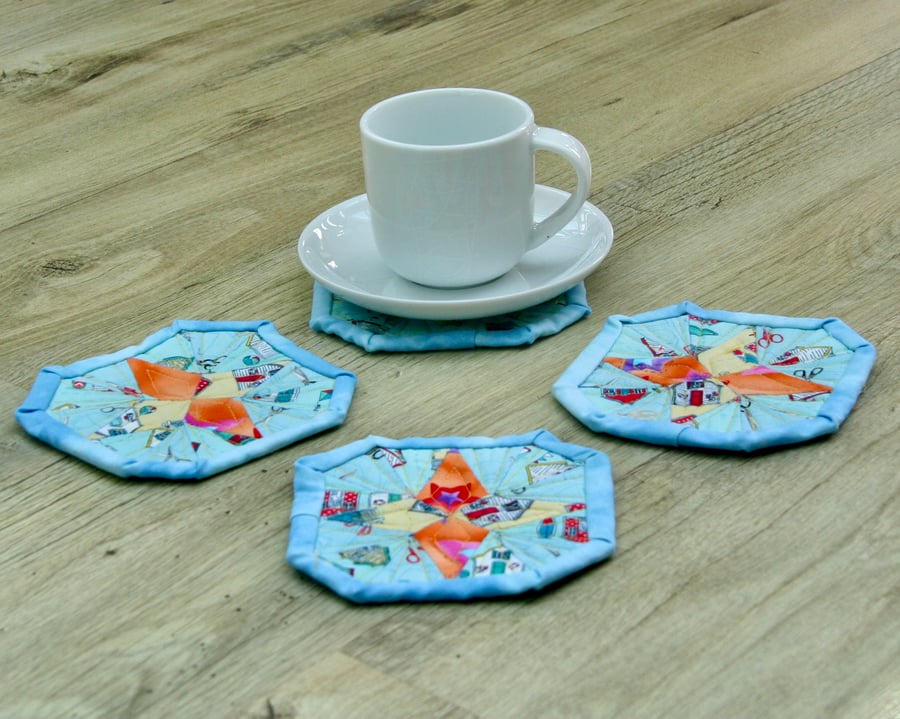 Four Fabric Coasters with Beach Huts and Stars