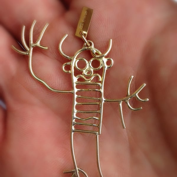 Solid 9ct gold pendant from a childs drawing with my own personal hallmark.