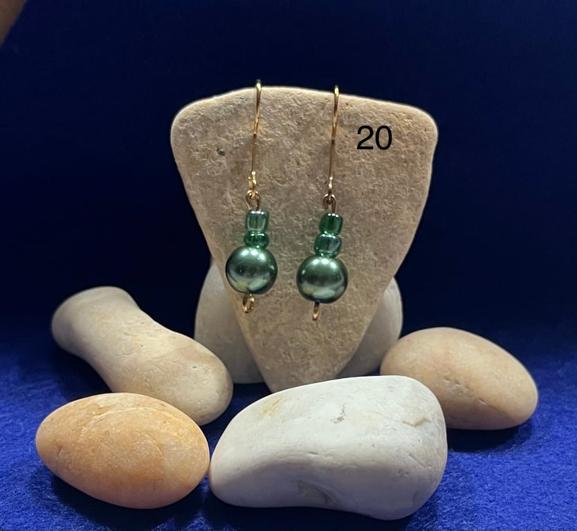 Beautiful green dangling earrings.