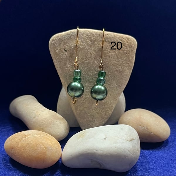 Beautiful green dangling earrings.