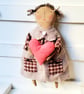 Sweet little primitive rag doll with heart