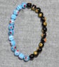 Pale Blue and Black-Amber Millefiori Bead Elastic Half and Half Bracelet - Image 3
