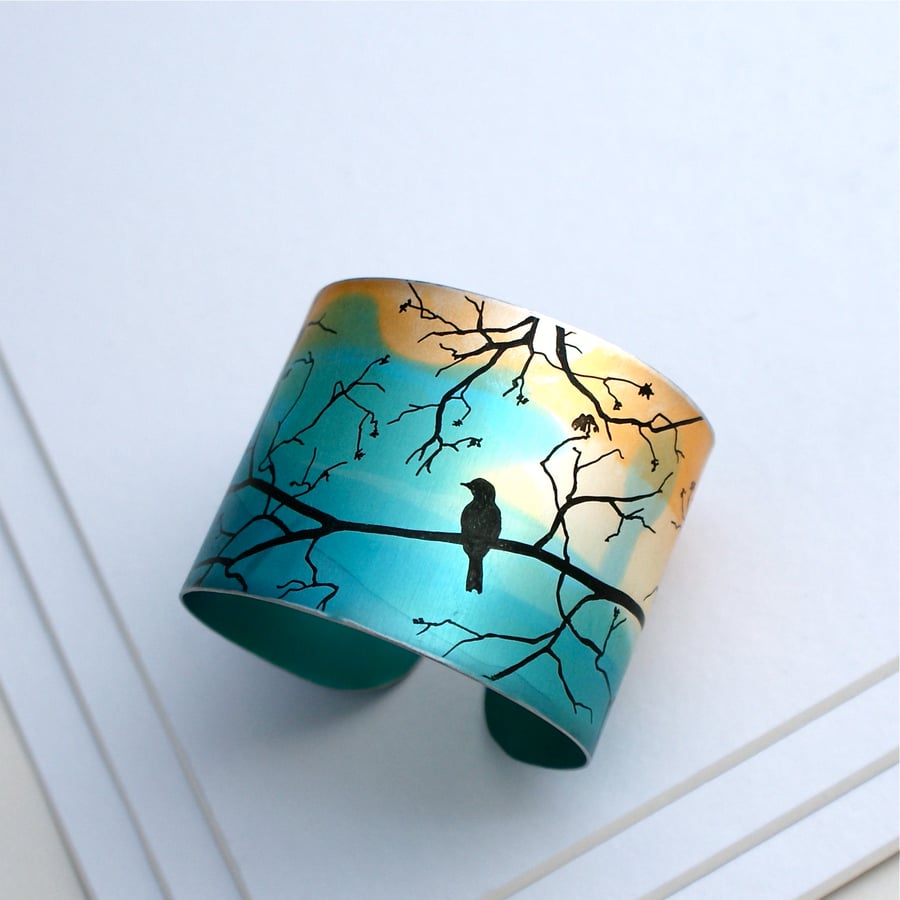 Bird on a branch turquoise cuff