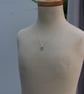 Small Silver Heart Pendant with Leaf Pattern - Image 7