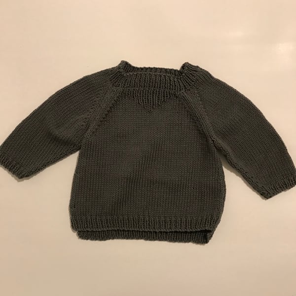 Hand knitted cotton baby jumper
