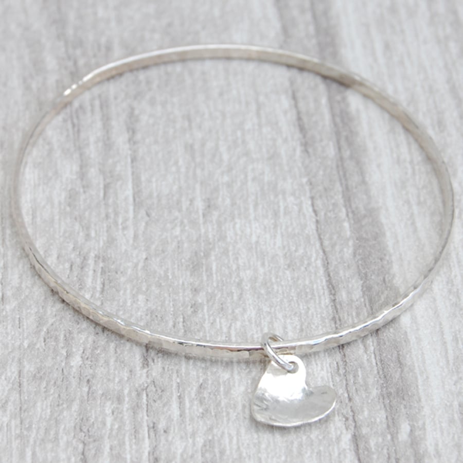 Silver heart on hammered skinny silver bangle