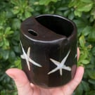 Black and white stars hand built ceramic travel mug