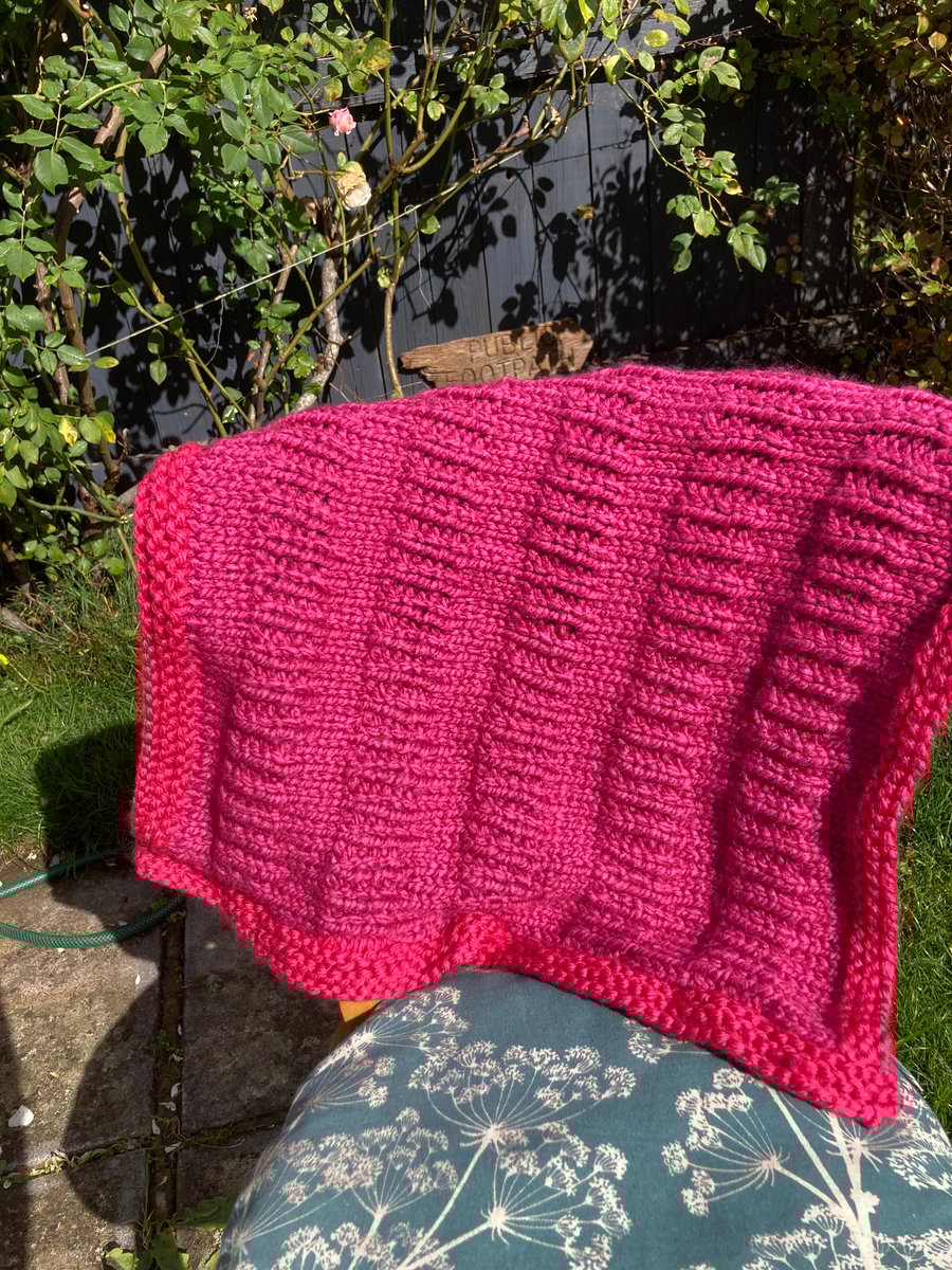 Hand knitted pram baby blanket 