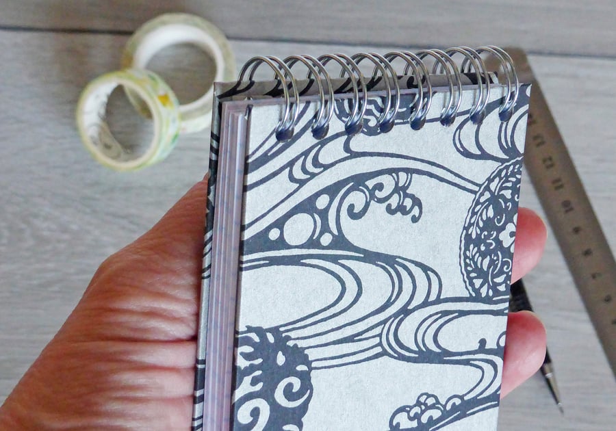 Handmade A7 Notebook covered in a Japanese pattern with a spiral binding