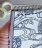 Handmade A7 Notebook covered in a Japanese pattern with a spiral binding - Image 1