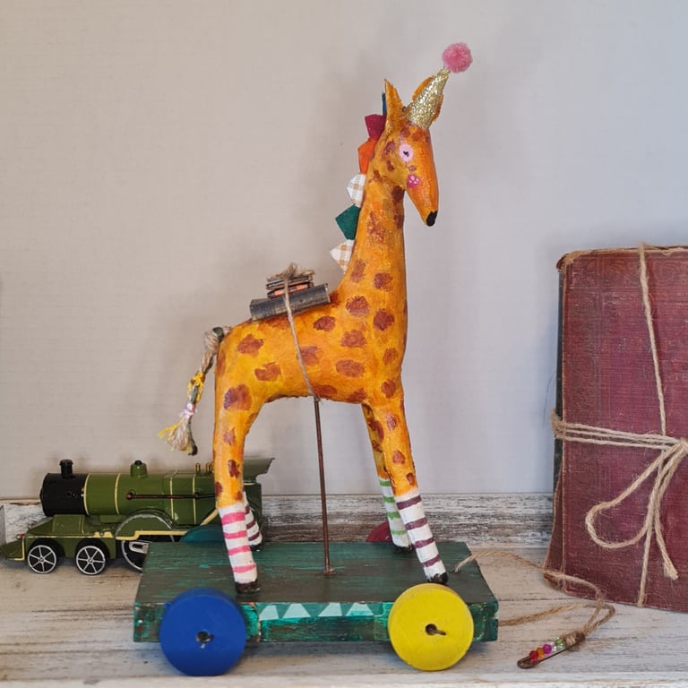 Handmade mixed media giraffe sculpture 