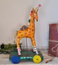 Handmade mixed media giraffe sculpture 
