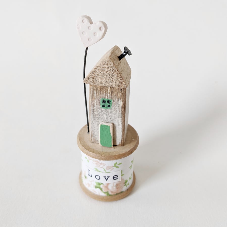 Wooden House on a Vintage Floral Bobbin with Clay Heart 'Love'