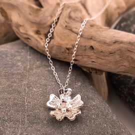 Fine silver flower pendant with Cubic Zirconia on a sterling silver chain