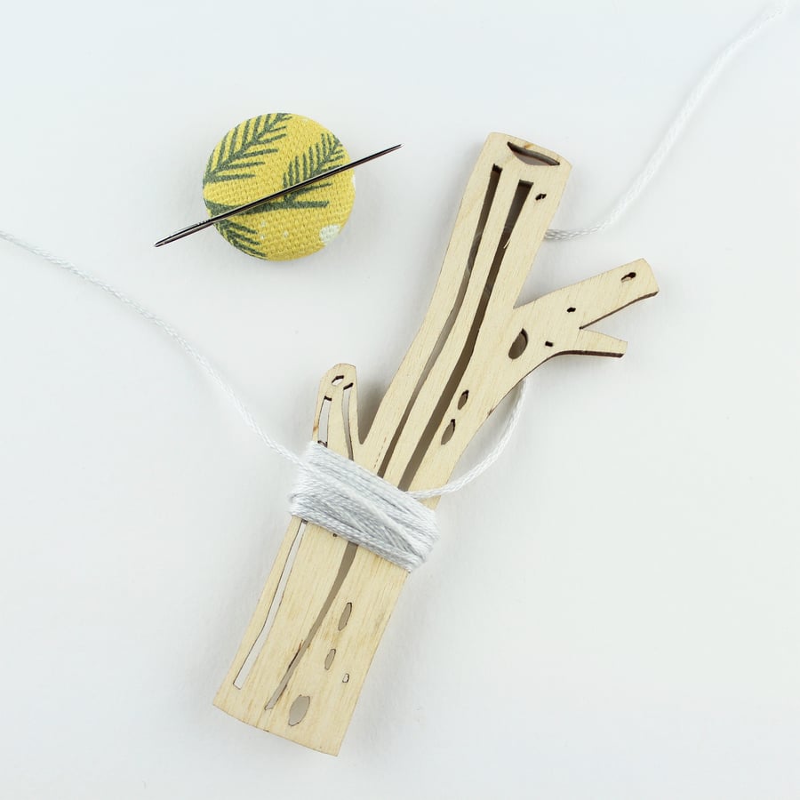 Woodland tree thread holder and magnetic needle minder