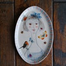 Figurative shallow dish. 