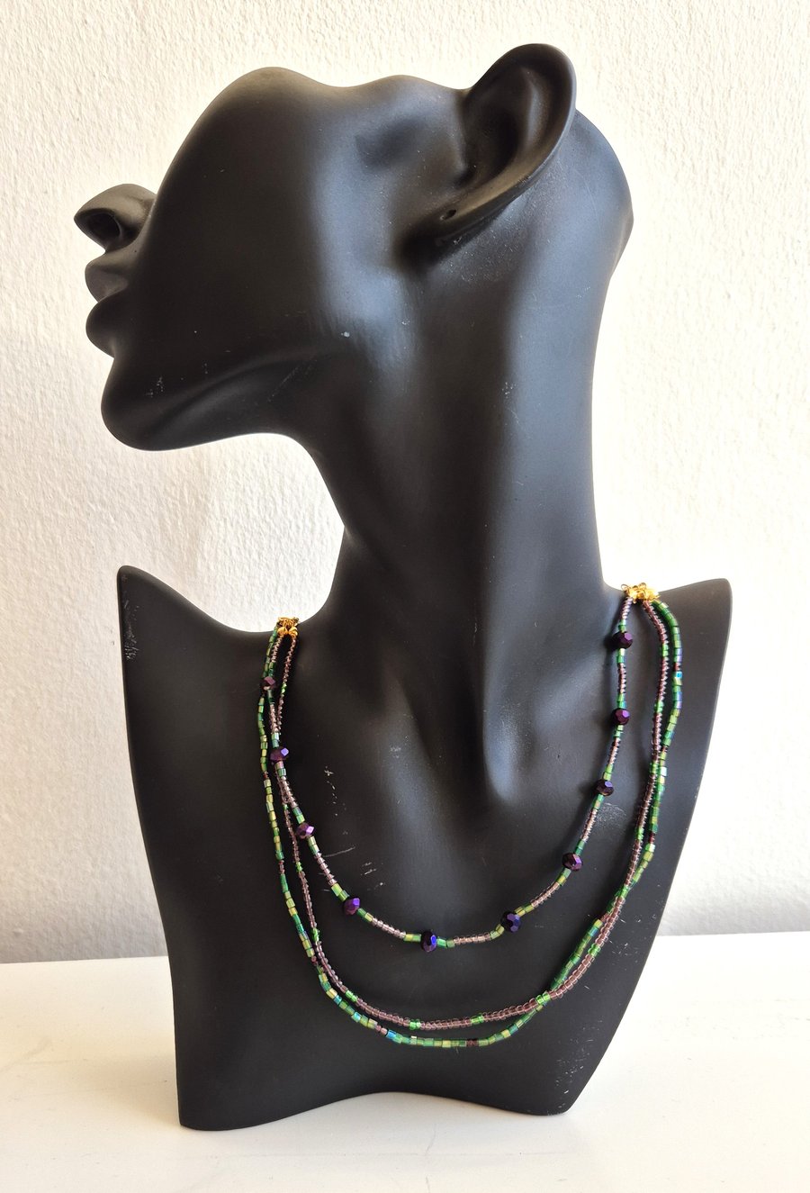 Green and Purple handmade three stand necklace.