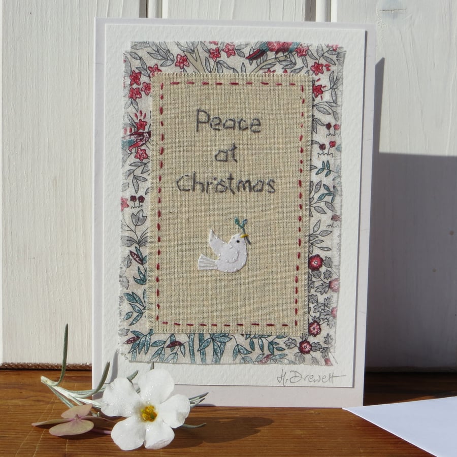 Peace at Christmas, hand-stitched text, dove, pretty Liberty background fabric