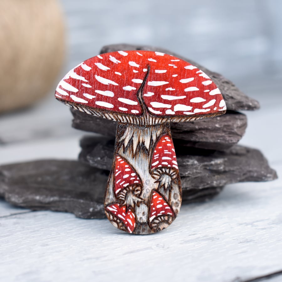 Red Toadstool Brooch created using pyrography.