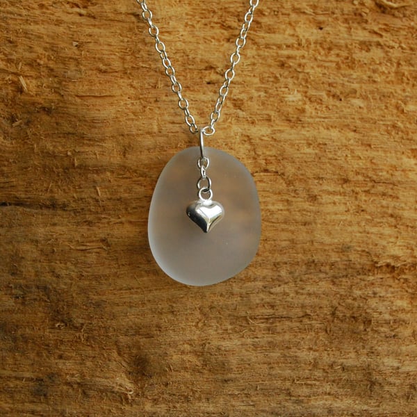 Little white beach glass pendant with tiny heart charm