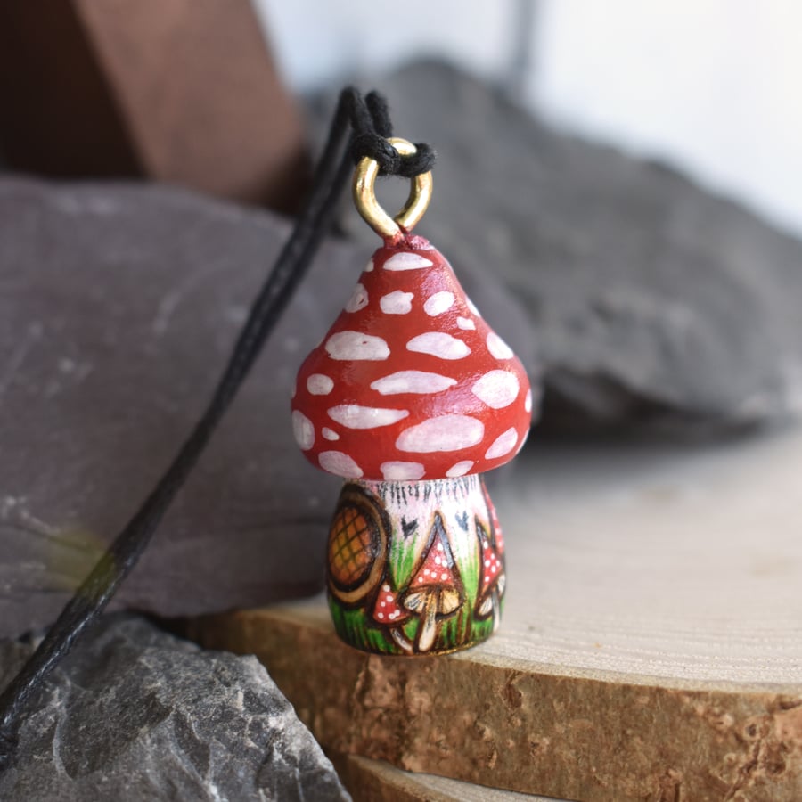 Tiny mushroom house. Hand burned and coloured Pyrography pendant.