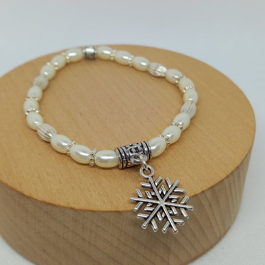 Cream and Silver Snowflake Charm Bracelet
